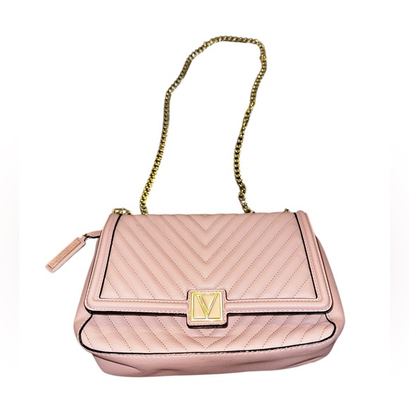 Victoria Secret purse has thick gold chain shoulder strap, magnetic snap pinkish